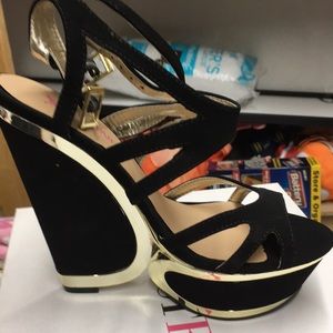 Just Fab black high heels.